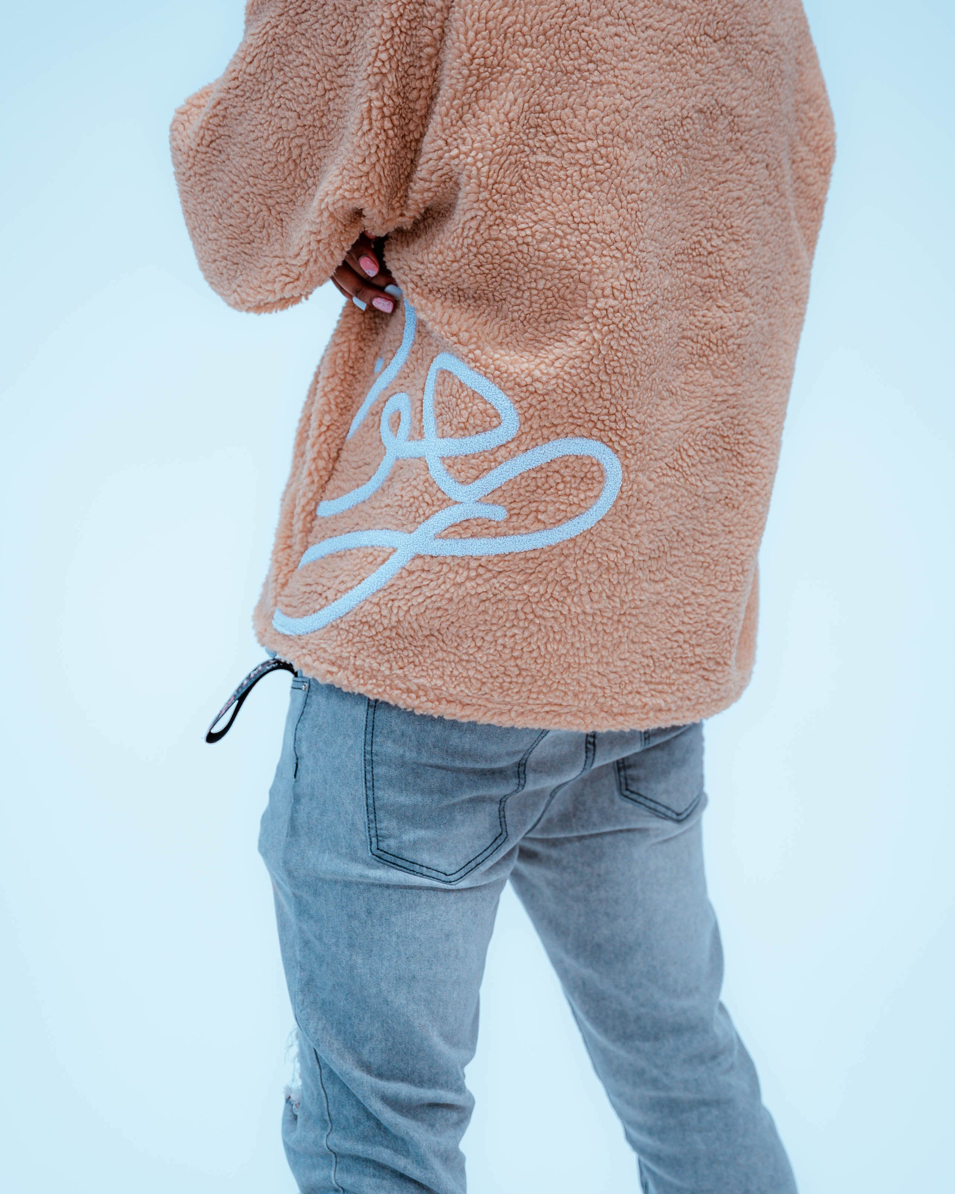 Back view of cozy ENDEN BRAND Sherpa brown jacket