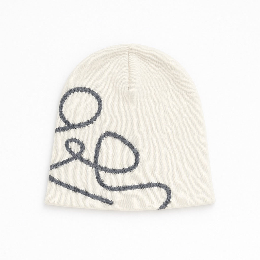 Front view of Vanilla Cloud ENDEN BRAND beanie in soft cream