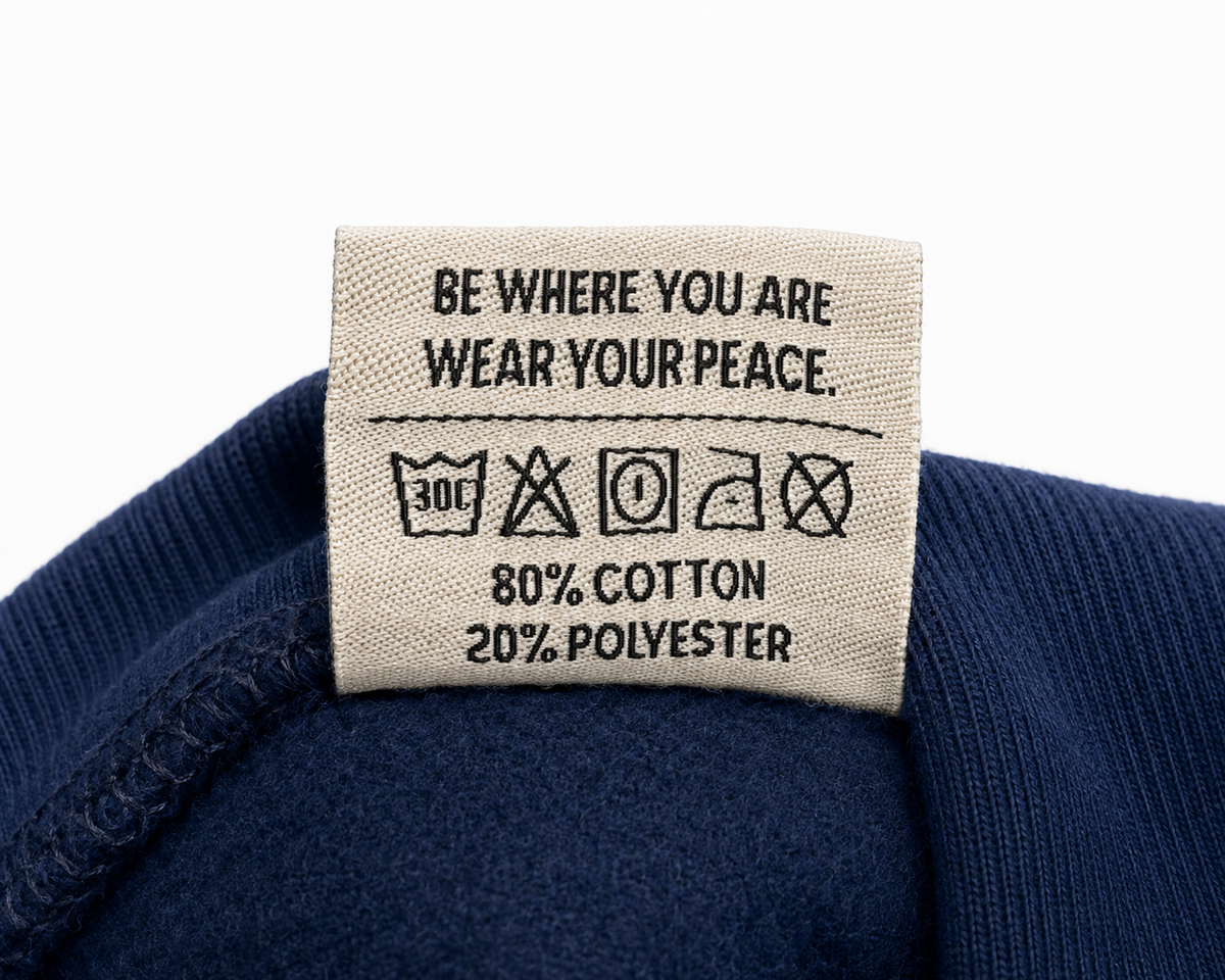 enden brand care tag detail on the navy more life zip up