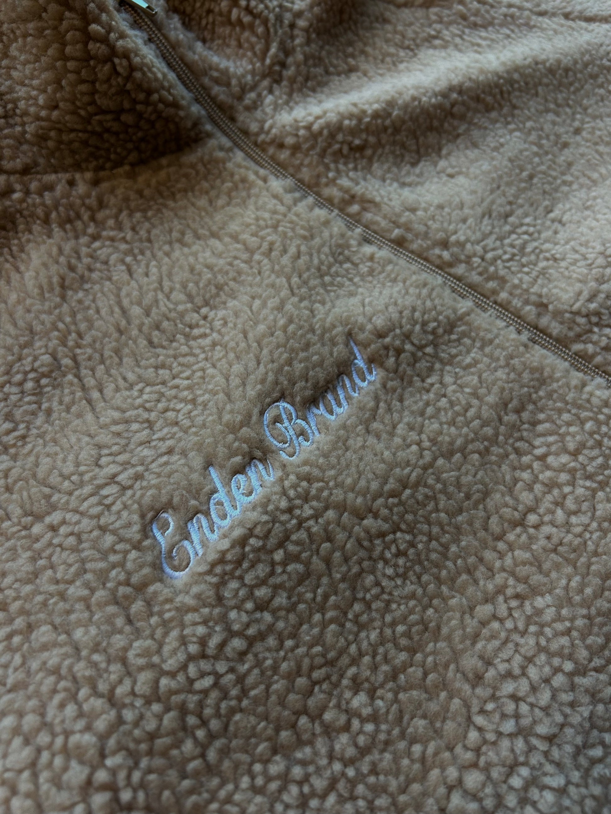 Close-up of plush Sherpa texture highlighting softness and warmth of ENDEN BRAND