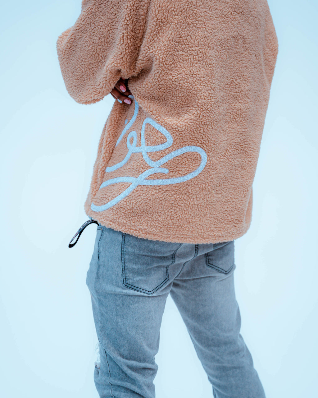 Back view of cozy ENDEN BRAND Sherpa brown jacket 