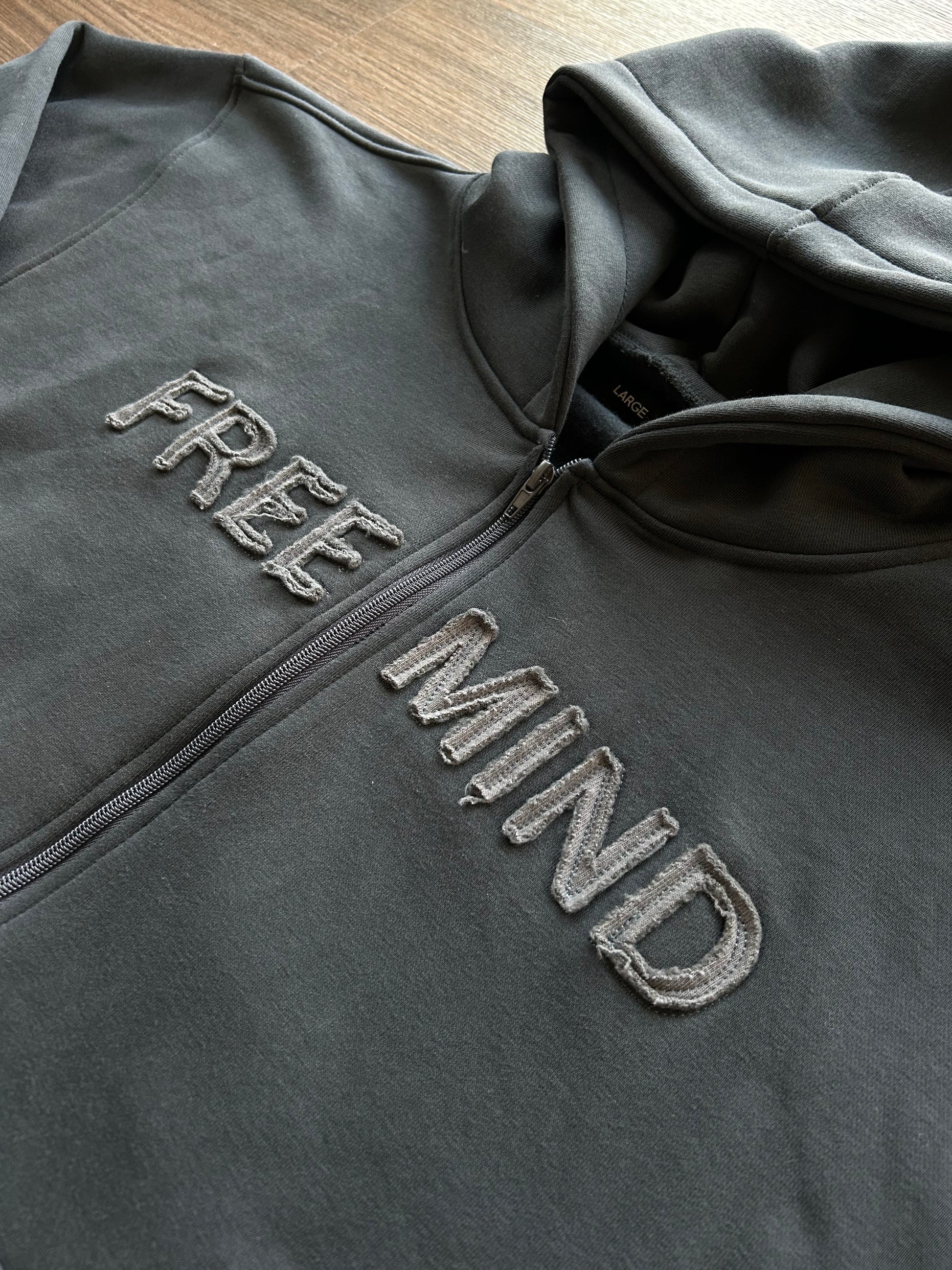 Up close picture of zip up hoodie embroidery