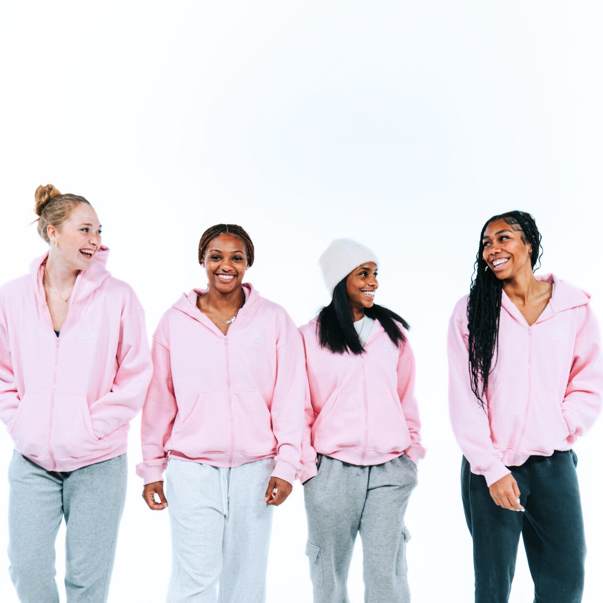 group of women wearing pink ENDEN BRAND hoodies